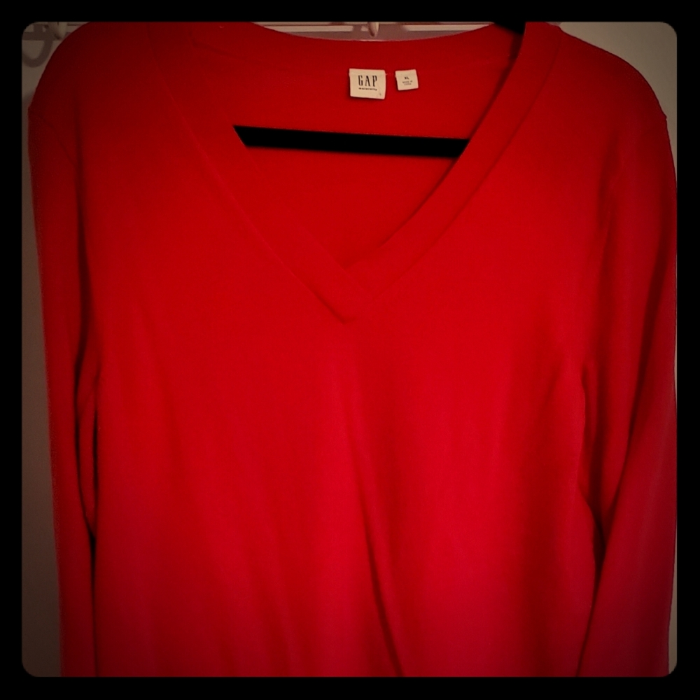 Red long sleeved V neck sweater